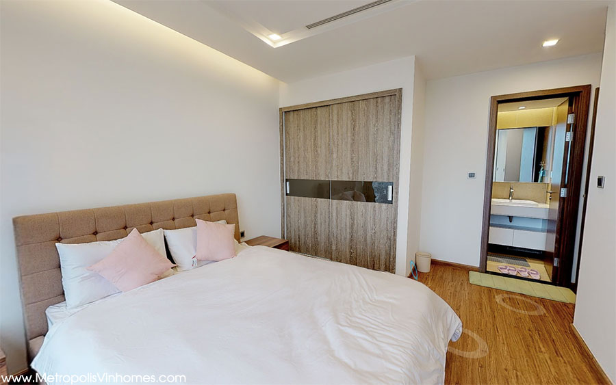 Large bedroom of M2 Metropolis Vinhomes apartment for rent.